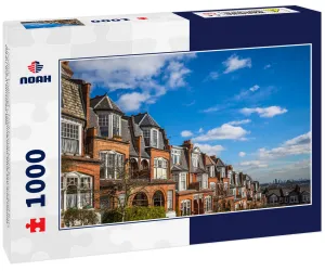 London, England - Traditional brick houses and flats on a nice summer morning with blue sky and clouds taken from Muswell Hill